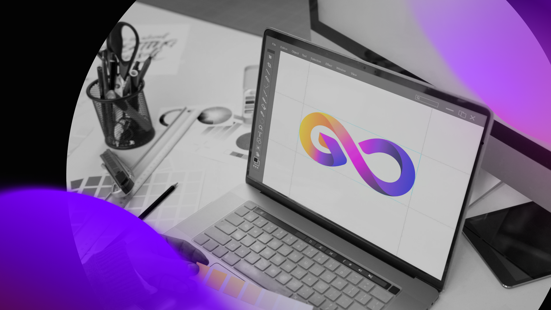 A laptop on a desk displays a colorful infinity symbol on its screen, surrounded by office supplies and a monitor. Purple abstract shapes overlay the image, hinting at innovative tools like AI SEO used in modern digital marketing.